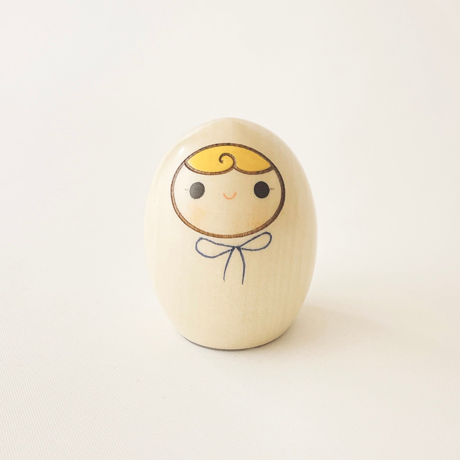 usaburo-kokeshi-heso-no-o-ire-ruban-bleu-bo-te-cordon-ombilical image 1