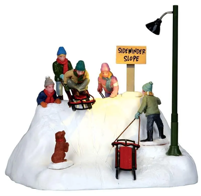 lemax-ready-to-launch-figurine-luge-anim-e-village-de-no-l image 1