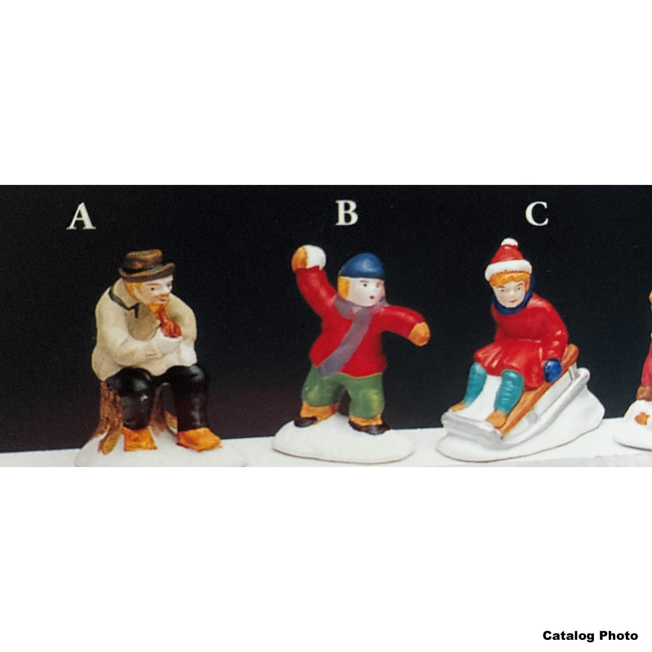 lemax-boy-throwing-snow-figurine-miniature-bataille-de-neige image 1