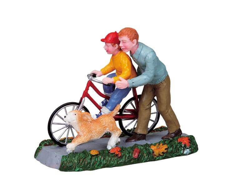 lemax-learning-to-ride-figurine-miniature-v-lo-enfant image 1
