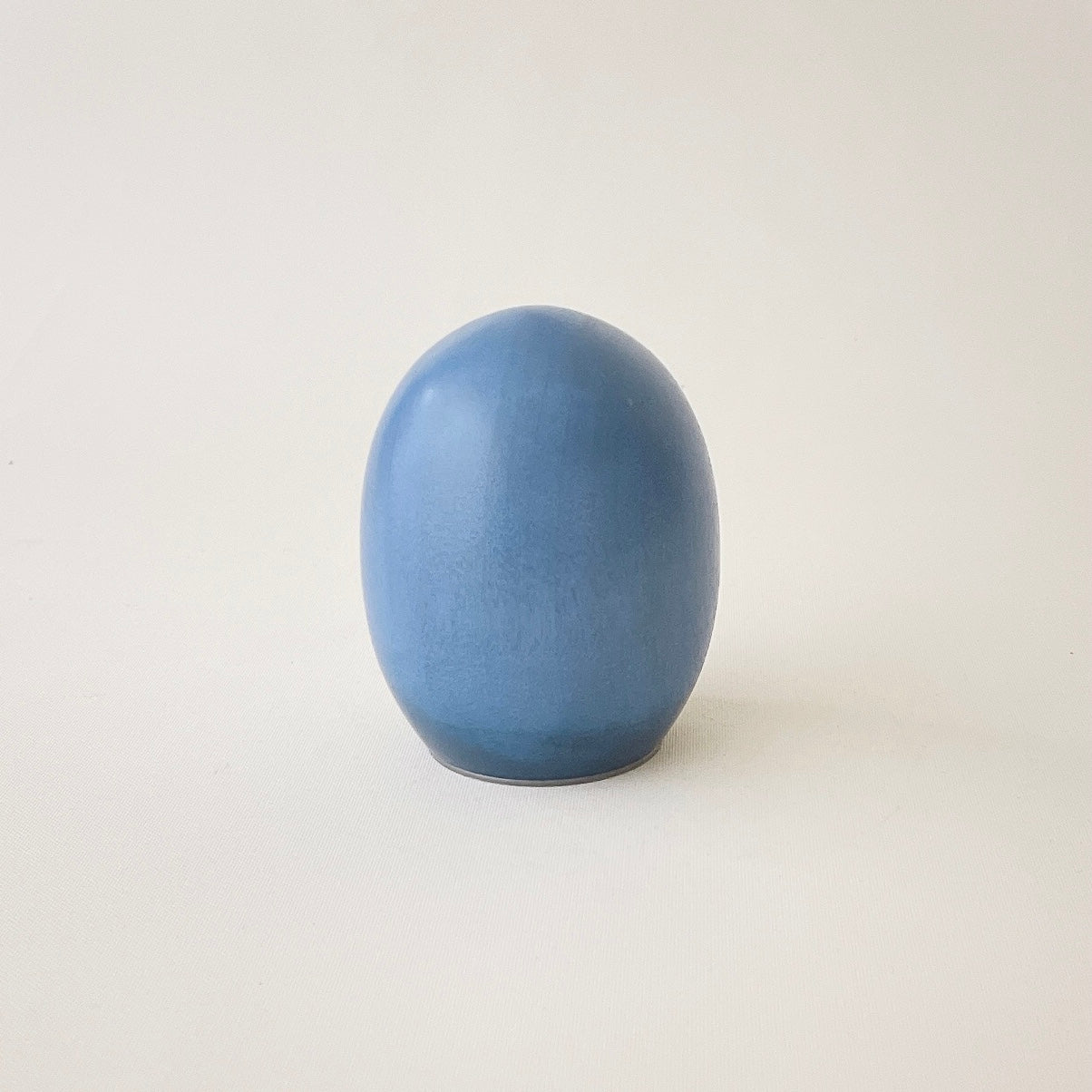 usaburo-kokeshi-yurakoro-heso-no-o-ire-blue-star-porte-cordon-ombilical-58x58x70 image 2
