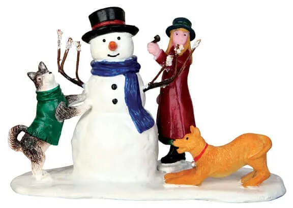 lemax-making-a-friend-figurine-miniature-sc-ne-amiti-hiver image 1