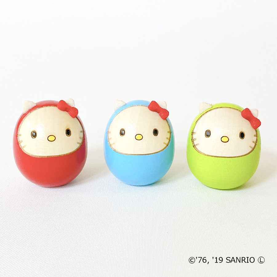 usaburo-kokeshi-hello-kitty-mame-daruma-bleu-clair-mini-figurine-3-5-cm image 2